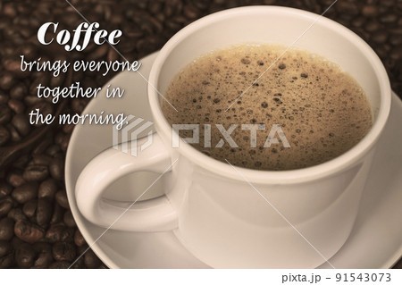 Motivational and inspirational quote on cup of coffee on coffee beans background Motivational and inspirational quote on cup of coffee on coffee beans background 91543073