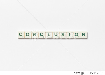 Conclusion formed of scrabble tiles on white background. 91544738
