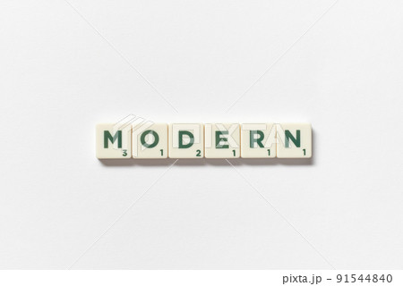 Modern formed of scrabble tiles on white background. 91544840