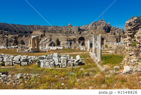 Ancient city ruins. Side. Colonnaded road and market place Ancient city ruins. Side. Colonnaded road and market place 91548826