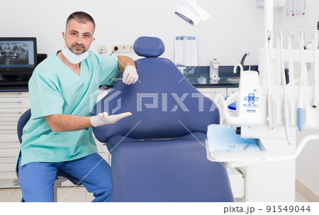 Portrait of a doctor dentist in uniform Portrait of a doctor dentist in uniform 91549044