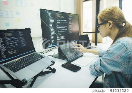 Programmer is coding and programming software. 91552529