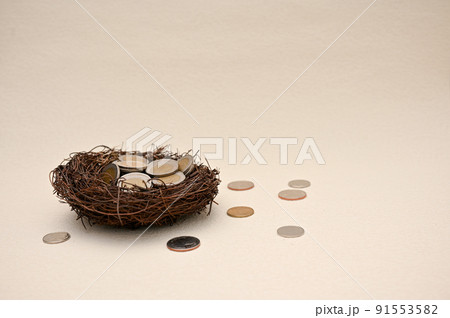 Thai baht or THB, Coins of Thailand in a bird nest on beige background. Thai baht or THB, Coins of Thailand in a bird nest on beige background. 91553582