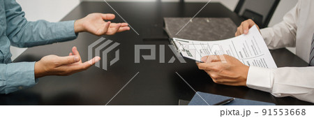 Recruitment concept, Male employer read CV resume to talking with candidate about work experience 91553668