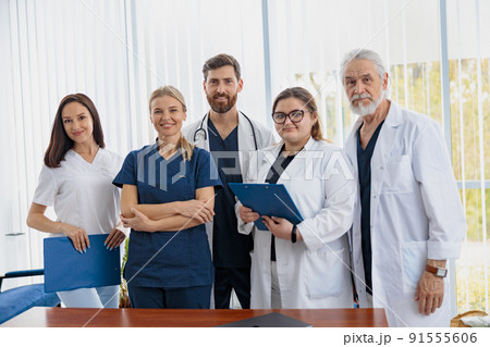 Portrait of a group of happy and successful doctors and nurses in hospital Portrait of a group of happy and successful doctors and nurses in hospital 91555606