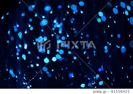 Fantastic blurry and bokeh dark blue theme background in the mystry cave. 91556425