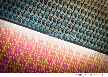 Bounced light inside graved green Thai pattern craft, bright out to the diamond shape on rose pink thai pattern style. 91556619