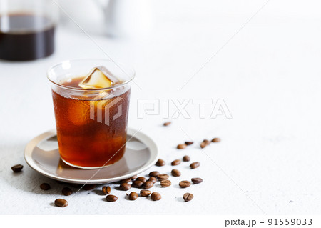 Iced Coffee on white marble table. Iced Coffee on white marble table. 91559033