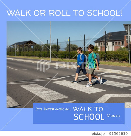 Caucasian boys crossing road and walk or roll to school, it's international walk to school month 91562650