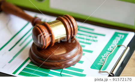 Judge gavel on statistics documents with charts and graphs Judge gavel on statistics documents with charts and graphs 91572170