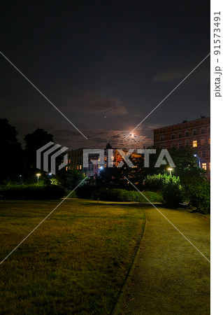 Beautiful night city sky in the park. Beautiful night city sky in the park. 91573491