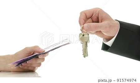 Exchanging money for house keys 91574974