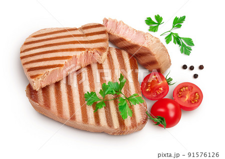 Tuna fish steak grilled isolated on white background with full depth of field, Top view. Flat lay Tuna fish steak grilled isolated on white background with full depth of field, Top view. Flat lay 91576126