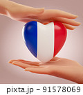 Two hands holding heart with flag of France. Concept of love, freedom, independence and country support. 3D rendering. 91578069