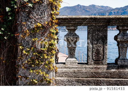 Stone balustrade over the sea. Close-up Stone balustrade over the sea. Close-up 91581433