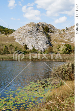 Lake near a rocky mountain in Durmitor National Park. Montenegro 91581902