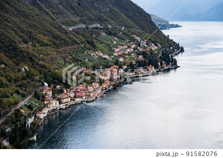 Colorful old town of Varenna at the foot of the mountains. Como, Italy. Top view Colorful old town of Varenna at the foot of the mountains. Como, Italy. Top view 91582076