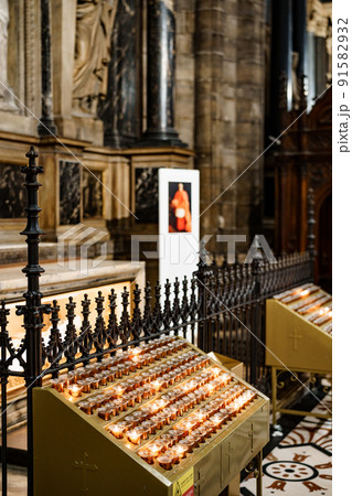 Stand for votive candles in a catholic church 91582932