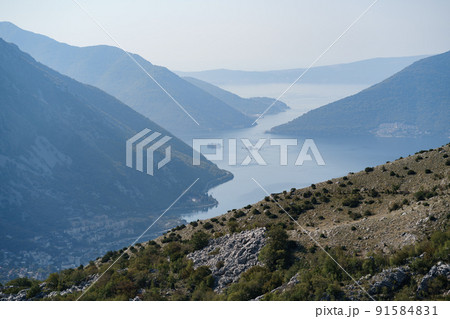 View from the mountain to the valley of the Kotor Bay View from the mountain to the valley of the Kotor Bay 91584831