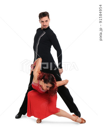 Passionate young couple dancing on white background Passionate young couple dancing on white background 91584954