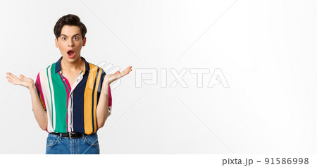 Image of surprised young male model staring at...の写真素材 