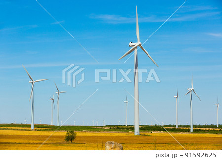 Image of wind power plants at fields near the town of La Muela Image of wind power plants at fields near the town of La Muela 91592625