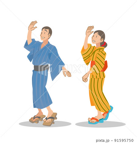 浴衣を着て盆踊りを踊る夫婦 91595750