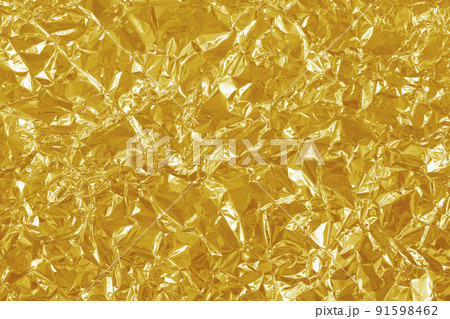 Gold foil leaf shiny texture, abstract yellow wrapping paper for background and design art work. Gold foil leaf shiny texture, abstract yellow wrapping paper for background and design art work. 91598462