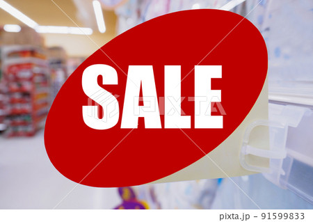 Supermarket sale sign display on shelves in department retail store Supermarket sale sign display on shelves in department retail store 91599833