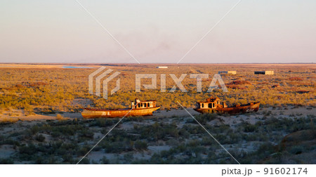 Panorama of ship cemetery at sunset near Moynaq, Karakalpakstan, Uzbekistan Panorama of ship cemetery at sunset near Moynaq, Karakalpakstan, Uzbekistan 91602174