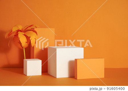 Front view of white and orange podium with and flower in a orange background for advertising , abstract content Front view of white and orange podium with and flower in a orange background for advertising , abstract content 91605400