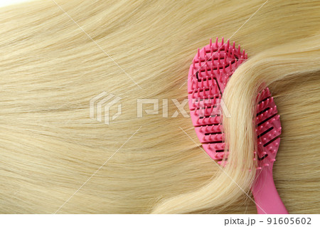Female hair with hair brush, space for text Female hair with hair brush, space for text 91605602