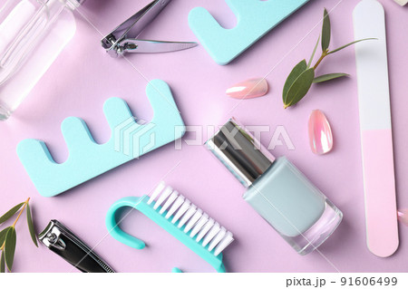 Concept of nail care with manicure accessories on pink background Concept of nail care with manicure accessories on pink background 91606499
