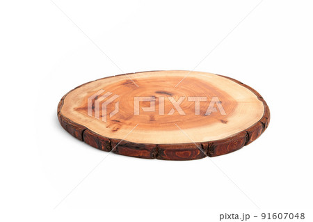 Wooden stand for a dish isolated on a white background. Tree trunk cut for product presentation demonstration 91607048