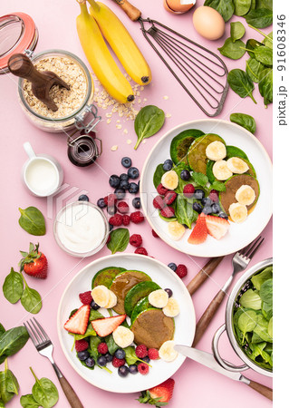 Spinach pancakes with fruits and vegetables 91608346