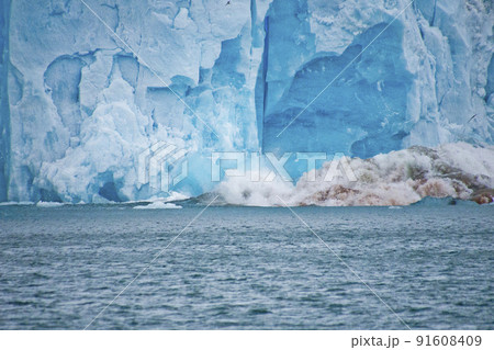 Ice Calving, Deep Blue Glacier, Signehamna Harbor, Norway 91608409