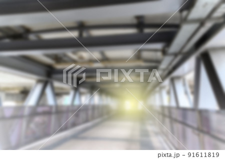 blurry background of sky walk way 91611819