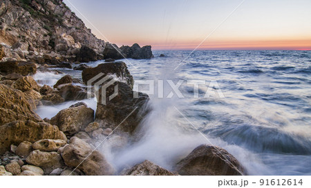Beautiful colorful sunset over the Black Sea in Crimea. Ukraine Beautiful colorful sunset over the Black Sea in Crimea. Ukraine 91612614