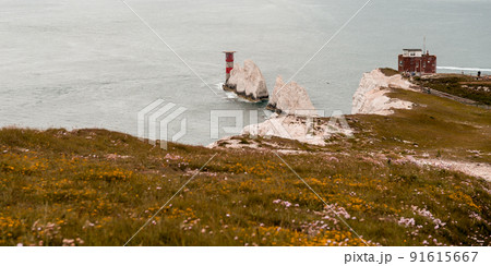 The Needles Isle of Wight. White chalk cliffs. White mountains with light house in the see 91615667