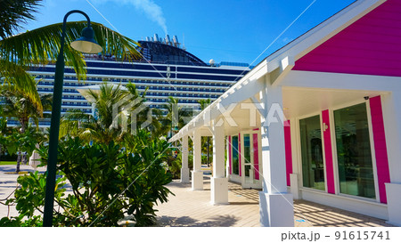 Beach on Ocean Cay Bahamas Island with a colorful houses and turquoise water Beach on Ocean Cay Bahamas Island with a colorful houses and turquoise water 91615741