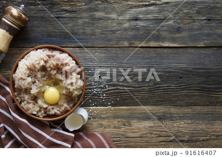 Cooking chicken minced meat with spices and egg Cooking chicken minced meat with spices and egg 91616407