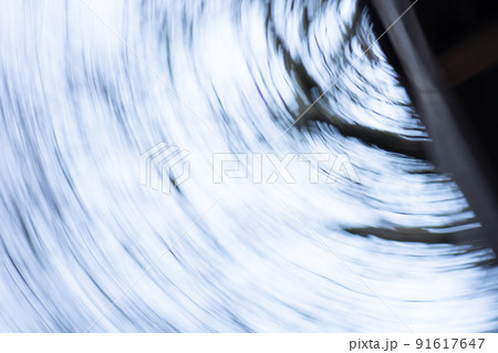 Bare tree branches on a pale white background defocused surface with bokeh Bare tree branches on a pale white background defocused surface with bokeh 91617647