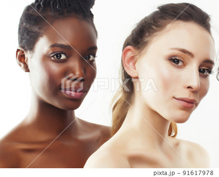 different nation woman: african-american and caucasian together isolated on white background happy smiling, diverse type on skin, lifestyle people concept close up 91617978