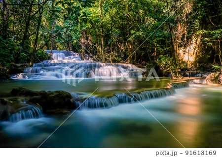 Long exposure exotic beautiful tropical deep rainforest waterfall Fresh turquoise waterfalls in deep forest of Huay Mae Khamin waterfall in the national park Beautiful landscape waterfalls. Long exposure exotic beautiful tropical deep rainforest waterfall Fresh turquoise waterfalls in deep forest of Huay Mae Khamin waterfall in the national park Beautiful landscape waterfalls. 91618169