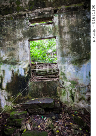 Remains of the destroyed houses of the Armero Town covered by trees and nature after 37 years of the tragedy caused by the Nevado del Ruiz Volcano in 1985 91621300