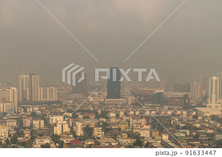 Aerial view of Dust in Bangkok city is full of harmful PM 2.5 dust with bad air pollution, the place to risk of respiratory and cancer. Aerial view of Dust in Bangkok city is full of harmful PM 2.5 dust with bad air pollution, the place to risk of respiratory and cancer. 91633447