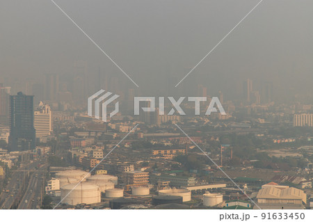 Aerial view of Dust in Bangkok city is full of harmful PM 2.5 dust with bad air pollution, the place to risk of respiratory and cancer. Aerial view of Dust in Bangkok city is full of harmful PM 2.5 dust with bad air pollution, the place to risk of respiratory and cancer. 91633450