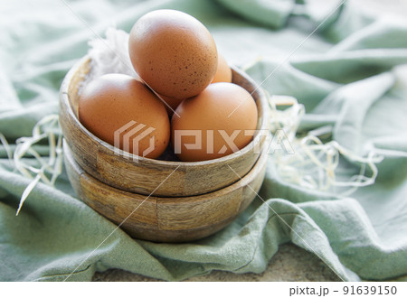Bowl of eggs on concrete background Bowl of eggs on concrete background 91639150