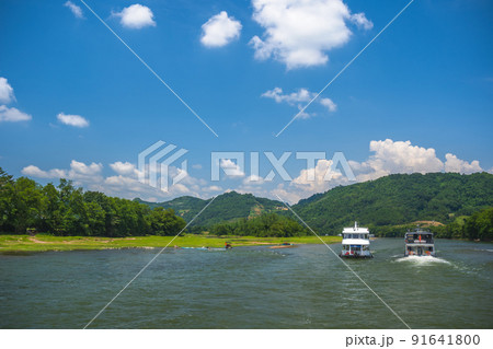 Tourist boats sailing on a Li River in China Tourist boats sailing on a Li River in China 91641800