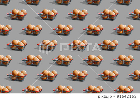 Seamless pattern of shopping baskets with eggs on gray background. Website background. Seamless pattern of shopping baskets with eggs on gray background. Website background. 91642165